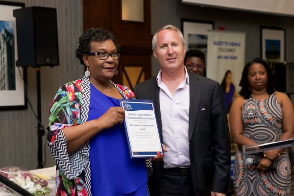 Mayor Collier Presentation to Mariska Thomas, President, Ajax Pickering - 2019 Awards